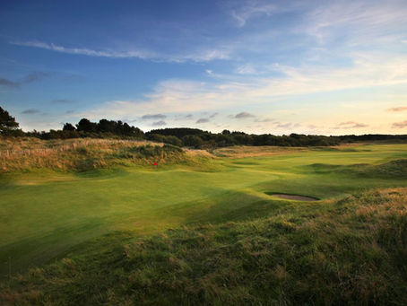 golf course in England with high grass surrounding the fairway