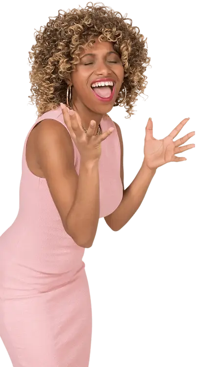 Joyful Black woman singing with confidence and open expression — representing the freedom and ease of technique-based vocal training.