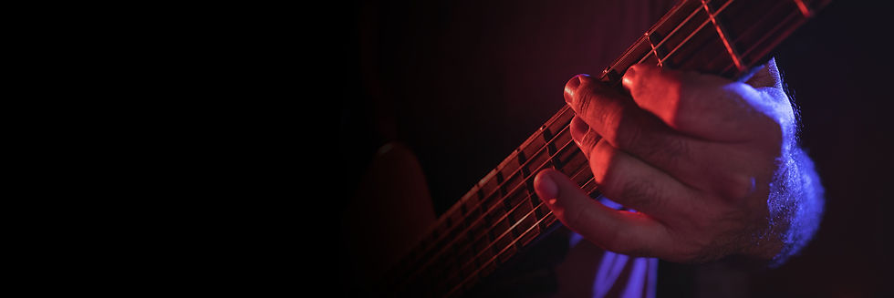 man-playing-electric-guitar_edited.jpg