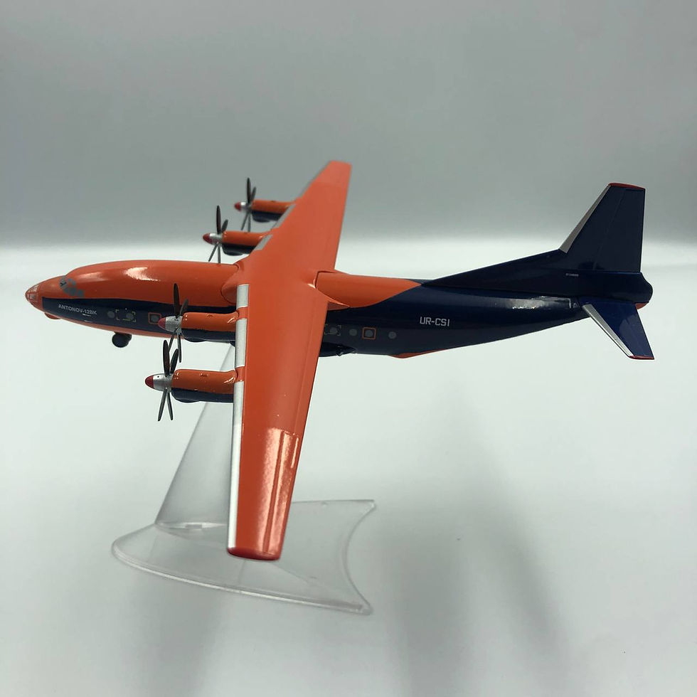 Прев'ю: Модель літака Antonov An-12 Cavok (ATMA) UR-SSJ (Orange/Black) масштаб 1:200