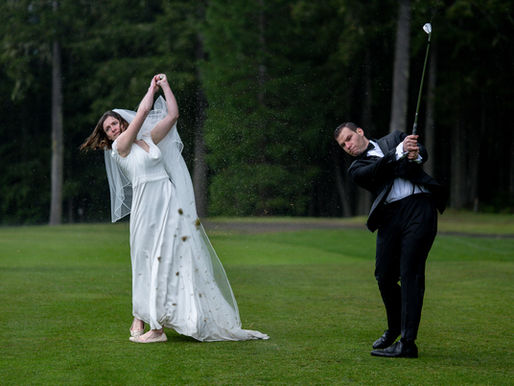 A bride and groom swing their clubs on the green, divots fly into the air