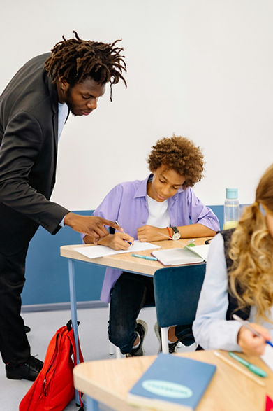 Black teacher and youth.jpg