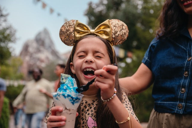 Child enjoying a snack at Disneys Animal Kingdom