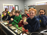 Kids with Gold Bars