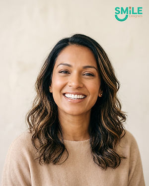 Woman with a radiant smile after a smile makeover, Smile Designers Dentistry