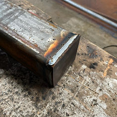 End of long, rectangular piece of metal