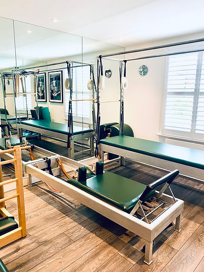Pilates studio with green equipment
