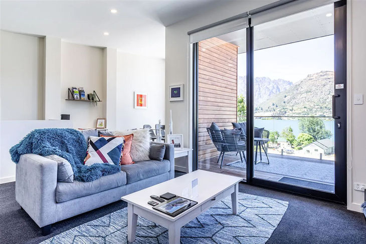 a living room with a couch and a coffee table