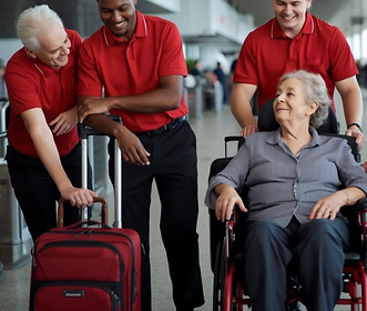 Airport Skycap agents wheeling an older woman through the airport in a wheelchair in Atlanta, GA