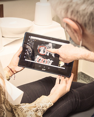 woman in blue denim jeans holding black tablet computer_edited.jpg