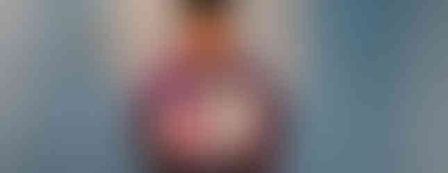 Fashion and Business Happy Hour attendee in the bubble bubble room.