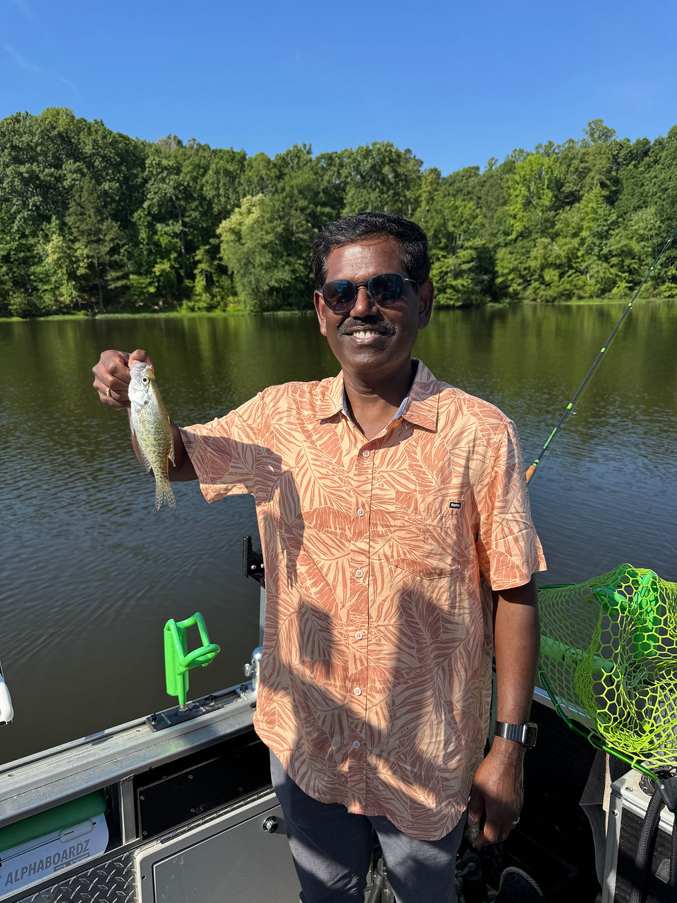 Angler holding crappie fishing Lake Chesdin with Goober Time Guide Service