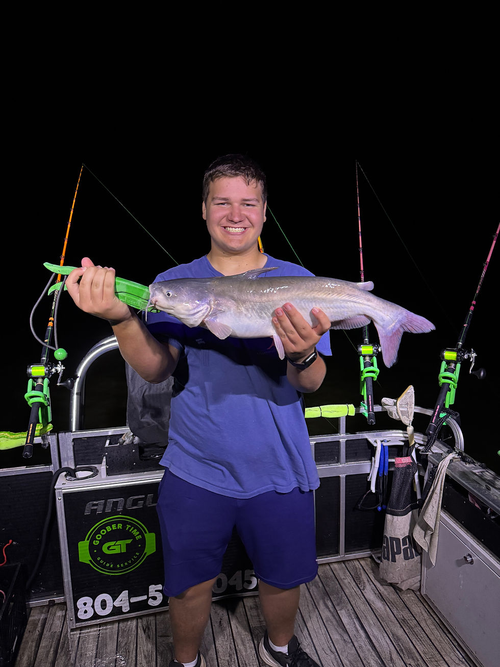 Angler showing off 7 lb blue catfish caught while fishing the James River with Goober Time Guide Service