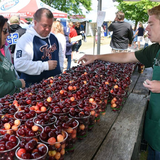 Customers viewing cherries
