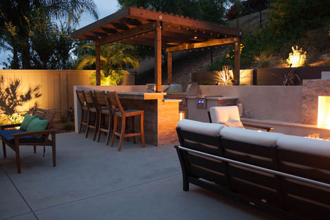 BBQ Island and Luxury Outdoor Living Space with Fireplace, BBQ, Patio Cover, Hardscape and Concrete.   Landscape design in San Diego
