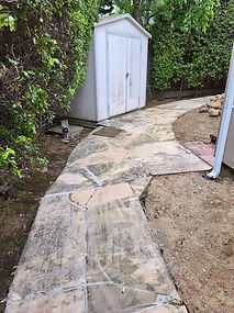 Shed & flagstone before pressure wash and seal