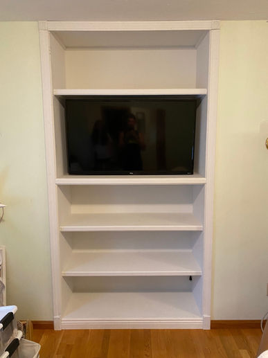 Built-in shelving unit with TV