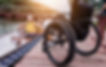 A man and a woman in a canoe and a wheelchair on the dock