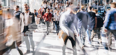 Crowd of people walking on a street in london.jpg