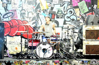 Blink-182 performing live on stage at Ruoff Music Center on 9/17/25