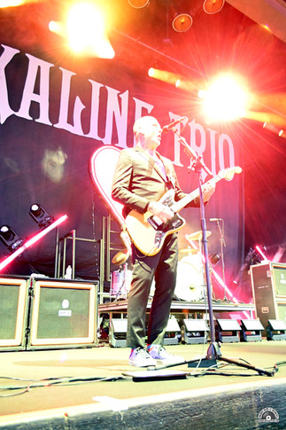 Alkaline Trio performing live on stage at Ruoff Music Center on 9/17/25