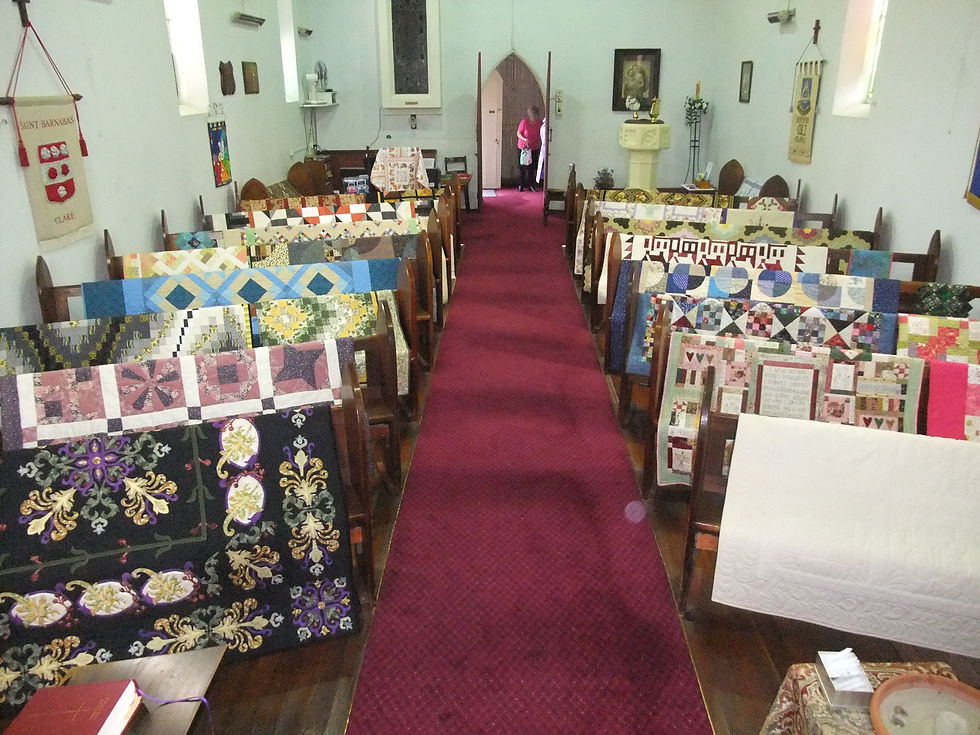 U3A Quilts on Pews at St Barnabas 