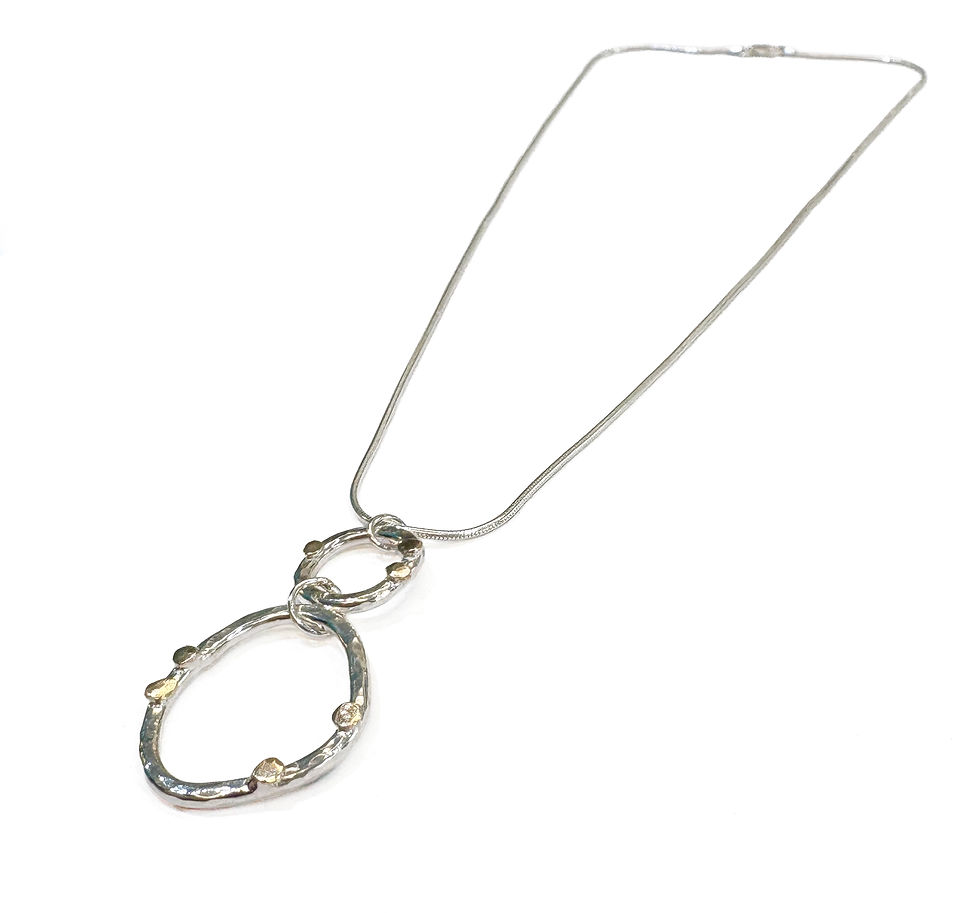 Thumbnail: silver and gold pendant