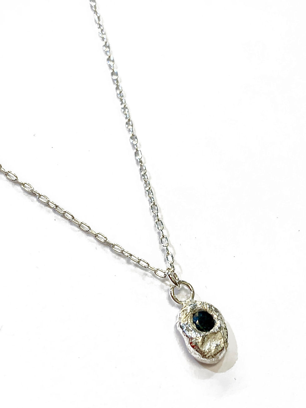 Thumbnail: Molten pendant with sapphire