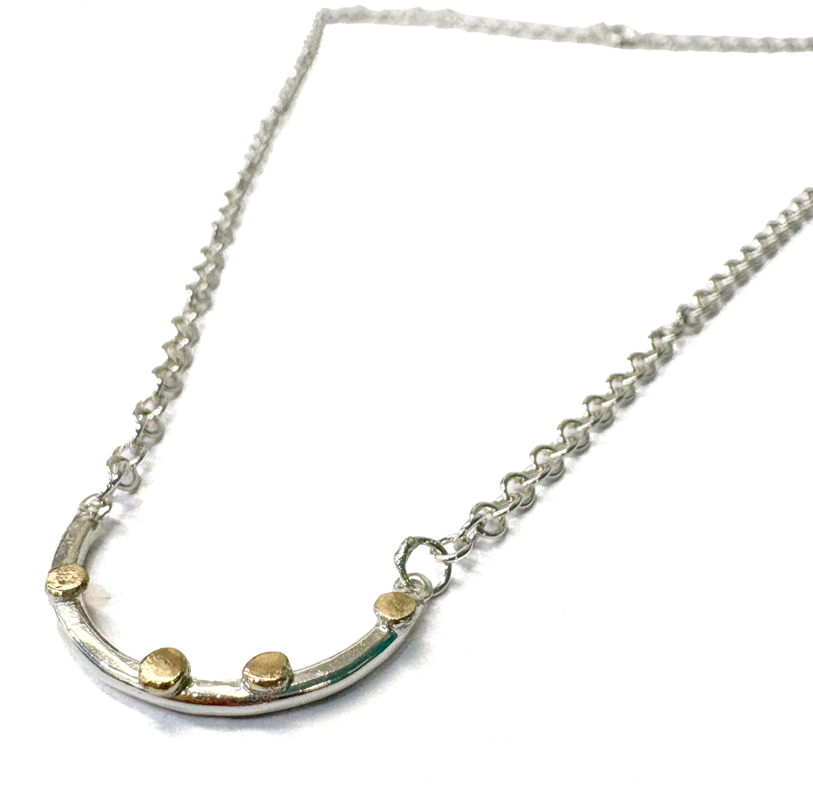 Abby Filer - Silver and gold curve necklace