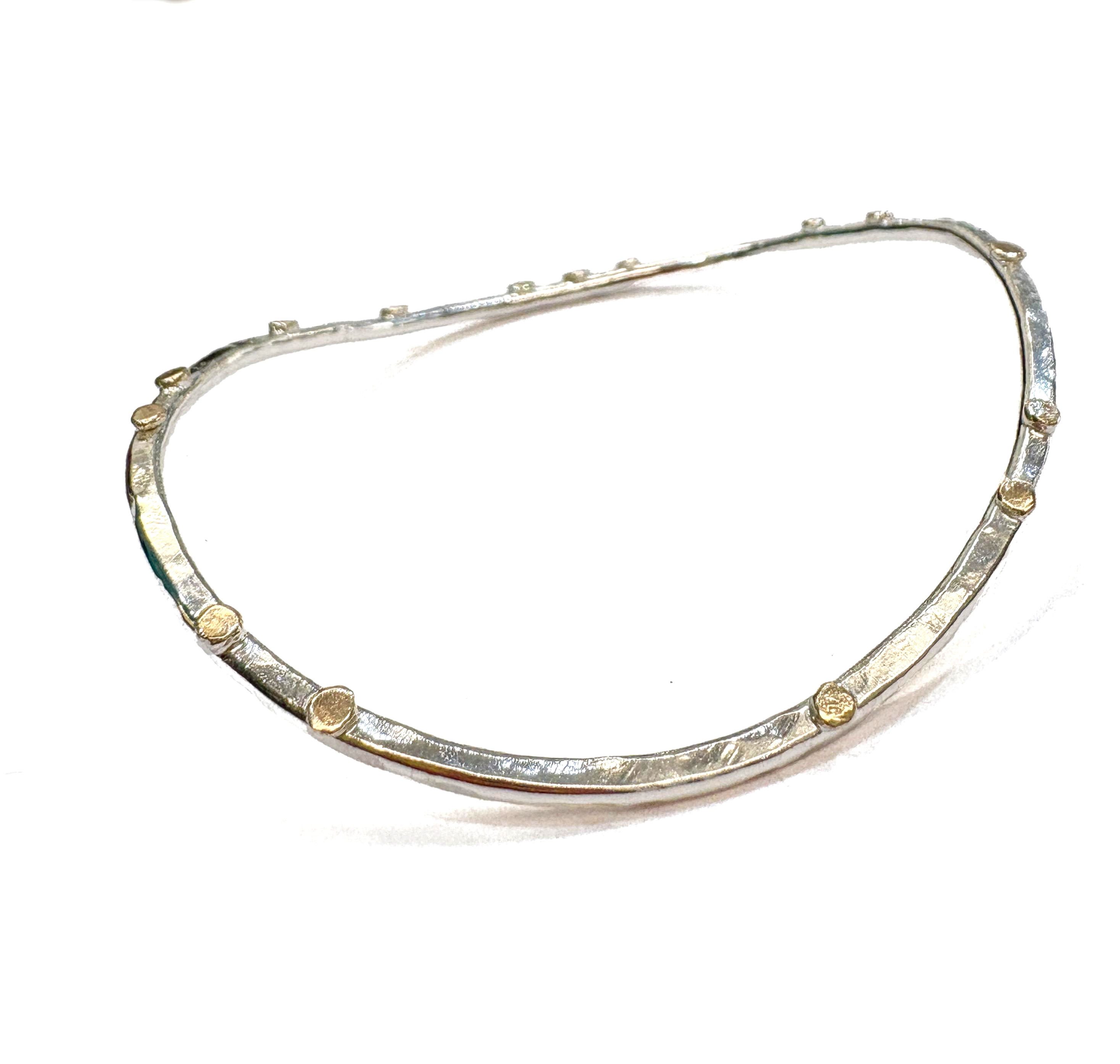Silver and 9ct gold curve bangle