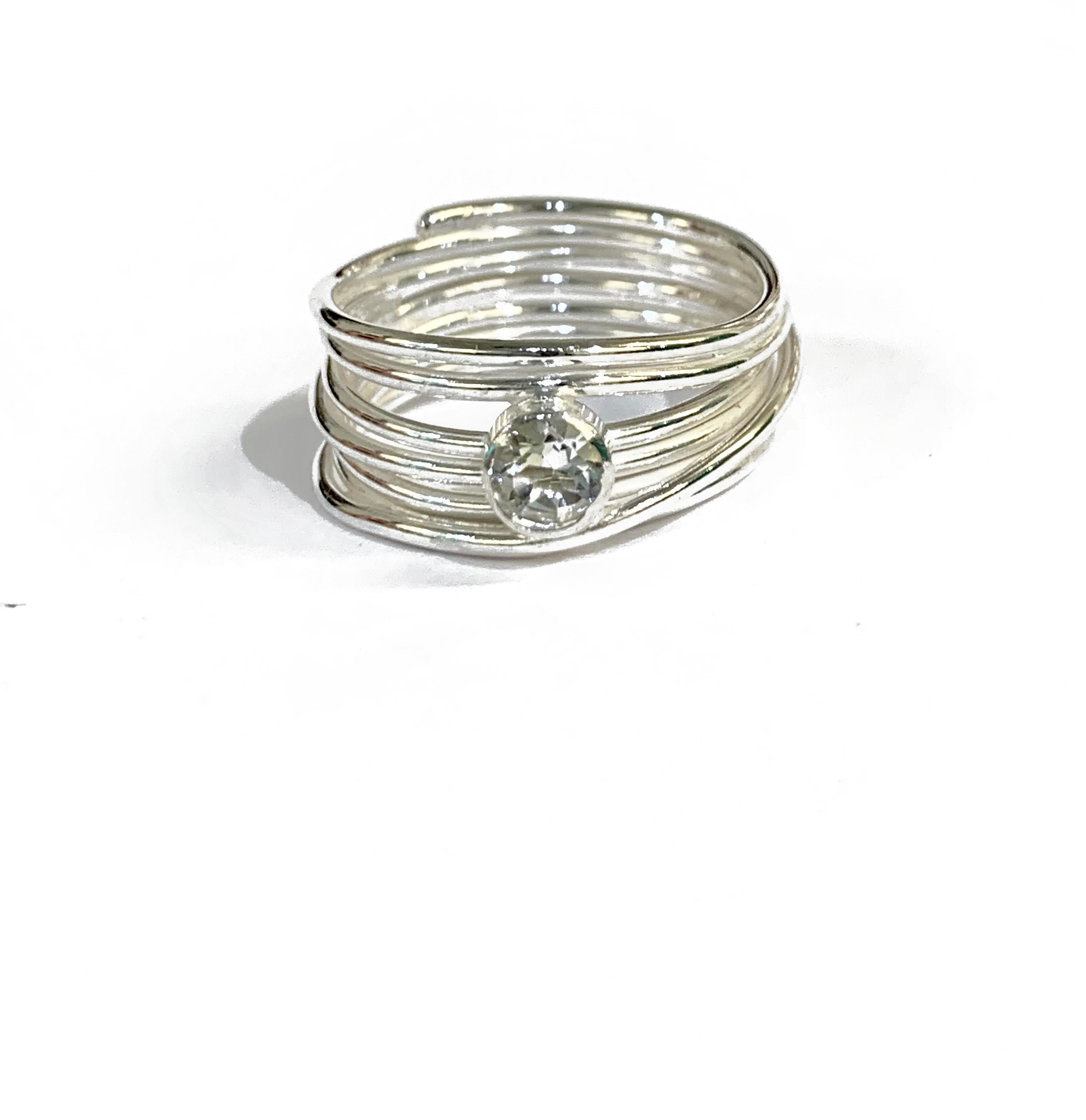 Abby Filer - wrapped aqua marine ring