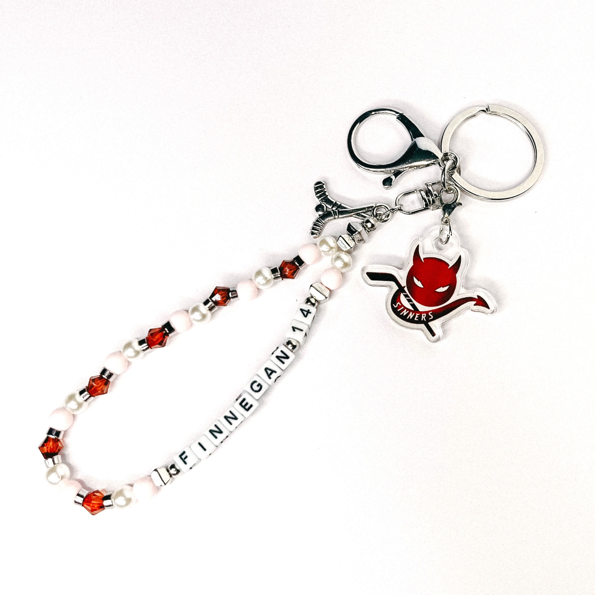 finnegan 14 beaded bag charm | st. paul sinners hockey | Author Pru Schuyler