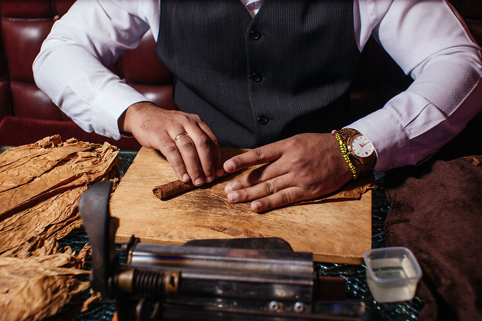 High angle view of a beautifully arranged cigar and its wooden box