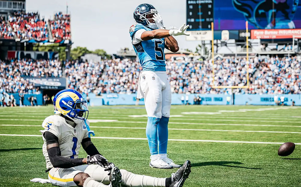 Elic Ayomanor celebrating a touchdown reception in Week 2 vs. Rams.