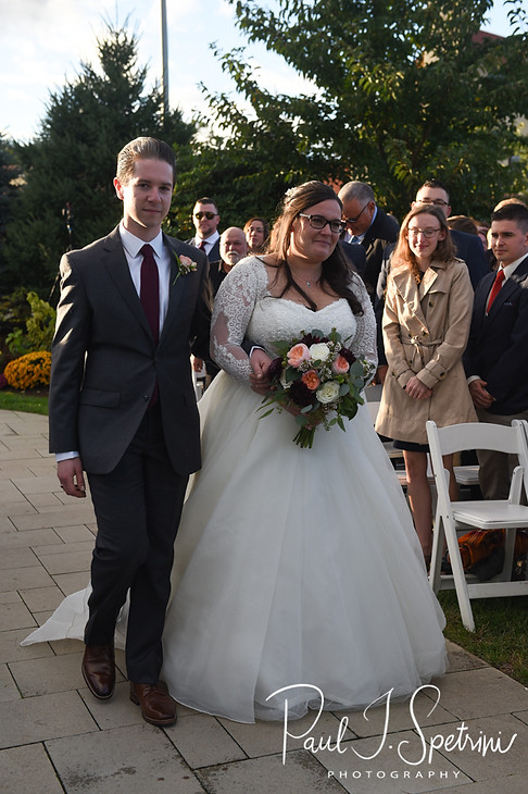 Katie walks down the aisle during her October 2018 wedding ceremony at The Villa at Ridder Country Club in East Bridgewater, Massachusetts.