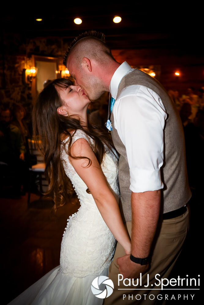 Krystal and Ian kiss during their May 2016 wedding reception at DeWolf Tavern in Bristol, Rhode Island.