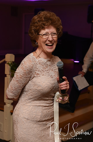 Friends and family members give toasts during Nate & Kaytii’s May 2018 wedding reception at Meadowbrook Inn in Charlestown, Rhode Island.