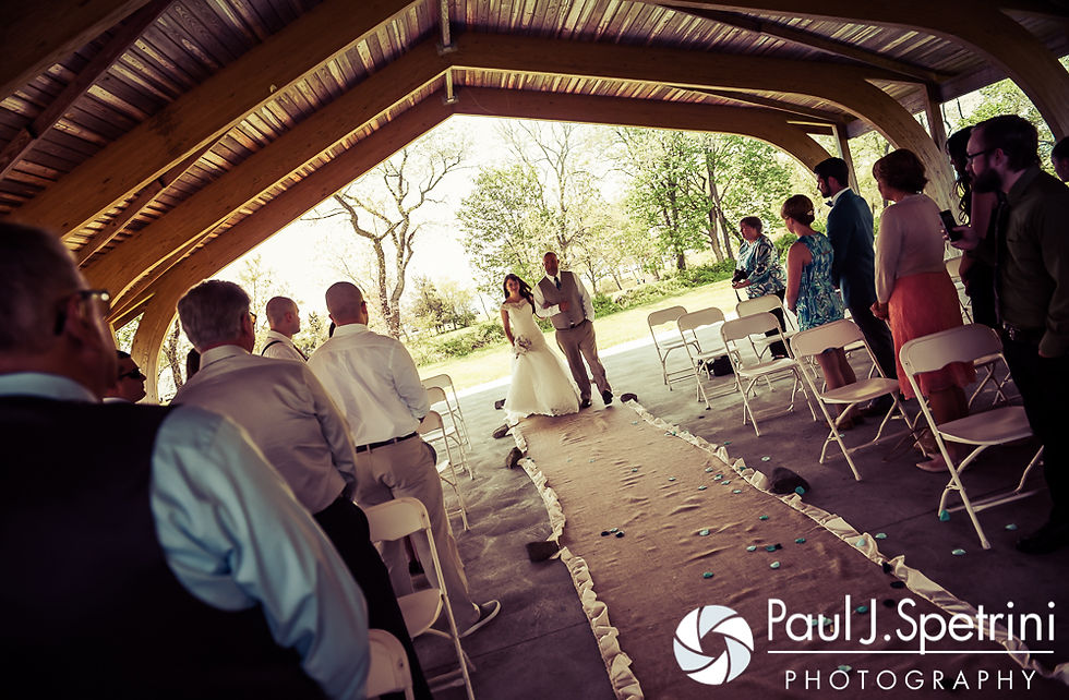 Krystal is escorted down the aisle by her father during her May 2016 wedding at Colt State Park in Bristol, Rhode Island.