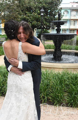 Amanda and Josh share a first look prior to their October 2018 wedding ceremony at the Walt Disney World Swan & Dolphin Resort in Lake Buena Vista, Florida.