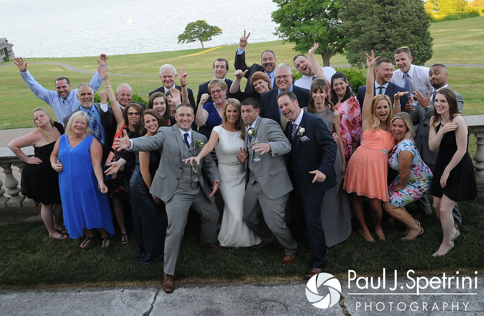 Amy and DJ pose for a large family photo during their June 2016 wedding reception at Aldrich Mansion in Warwick, Rhode Island.