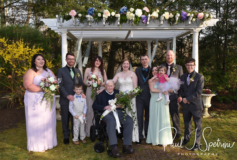 Nate & Kaytii pose for a formal photo with family members following their May 2018 wedding ceremony at Meadowbrook Inn in Charlestown, Rhode Island.