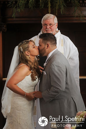 Nathan and Amy kiss during their November 2017 wedding ceremony at First Unitarian Church of Providence in Providence, Rhode Island.