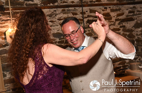 Guests dance during Krystal and Ian's May 2016 wedding reception at DeWolf Tavern in Bristol, Rhode Island.