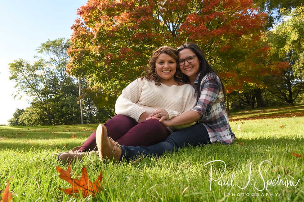 Brittany & Alisa pose for a photo during their October 2018 engagement session at Roger Williams Park in Providence, Rhode Island.