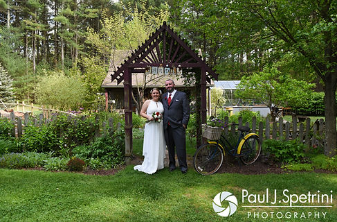 Latasha and Justin smile for formal photos prior to their May 2016 wedding at Country Gardens in Rehoboth, Massachusetts.