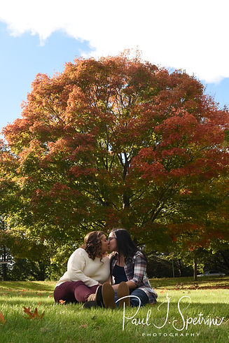 Brittany & Alisa pose for a photo during their October 2018 engagement session at Roger Williams Park in Providence, Rhode Island.