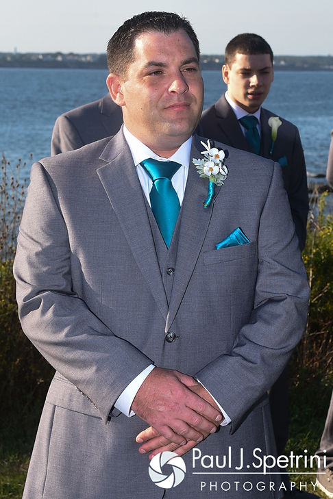 Paul watches Marissa come down the aisle during his September 2016 wedding ceremony at Beavertail Lighthouse in Jamestown, Rhode Island.