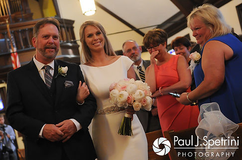 Amy walks down the aisle during her June 2016 wedding ceremony at St. Thomas More Church in Narragansett, Rhode Island.