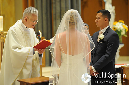 Shawn smiles for a photo at the Kay Chapel in Newport, Rhode Island prior to his spring 2016 Rhode Island wedding.
