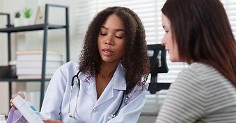 Doctor explaining abdominal cancer diagnosis to patient